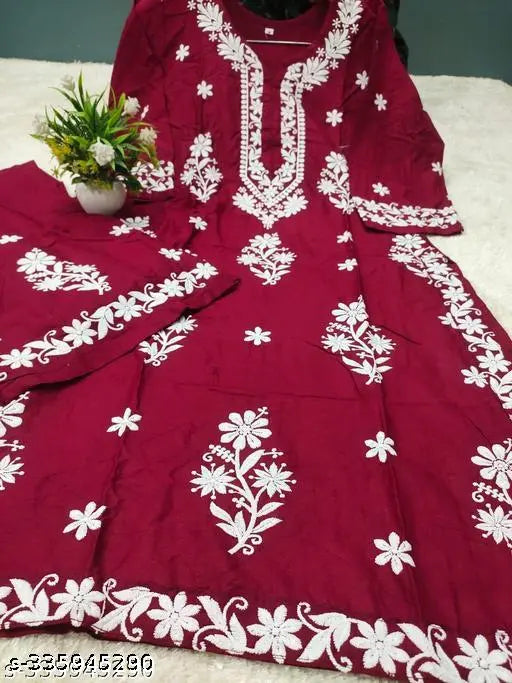 Embroidered rayon Chikankari kurta and palazzo set, three-quarter sleeves, Indian handcrafted traditional clothing on mannequin