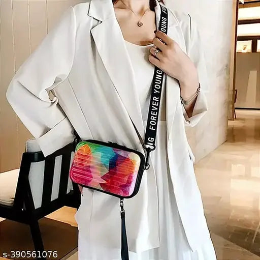 Modern women's multicolor boxy sling bag, acrylic, colorblock design on display stand