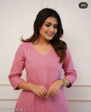 Pink cotton katha kurta set for summer use, solid design on three-quarter sleeve palazzos. Single size available in M, L, XL, XXL. Made in India." (123 characters)
