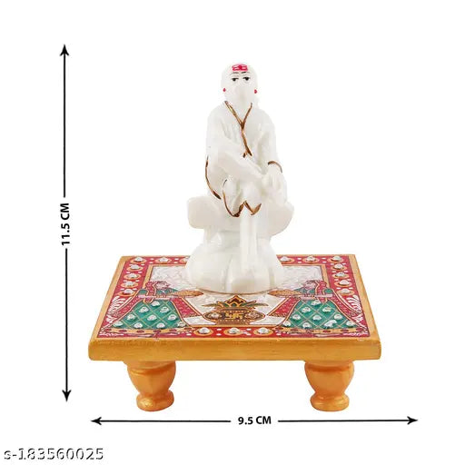 Marble & polyresin Sai Baba Idol with marble Chowki (Sinhasan) - exudes elegance, adds spirituality to Pooja room decor or home. High-quality craftsmanship, versatile use, sacred symbol of divine love