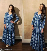 Blue rayon ankle-length kurta gown with printed net, three-quarter sleeves. Indian party wear for women and girls