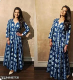 Blue rayon ankle-length kurta gown with printed net, three-quarter sleeves. Indian party wear for women and girls