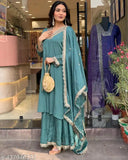 Stylish silk sharara set for women, printed kurta with dupatta and bottomwear on mannequin