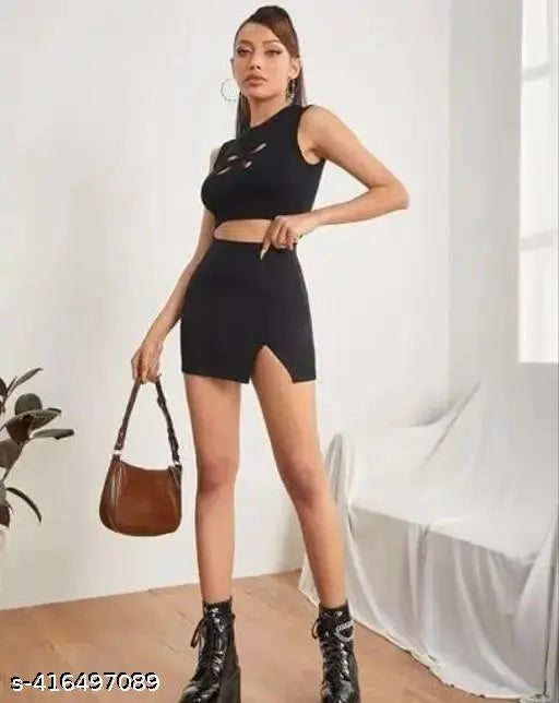 Mini pencil-style black polyester skirt with attached lycra shorts. Comfortable and versatile women's fashion piece for all seasons and occasions