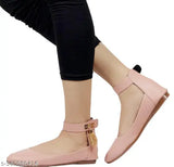 Stylish peach synthetic leather bellies shoes for women under 300, featuring velcro fastening and black insole. Perfect for parties, casual wear, or festive occasions. Versatile with leggings, jeans, jeggings, or palazzo. Comfortable half-inch PVC sole and back belt detail. Indian origin