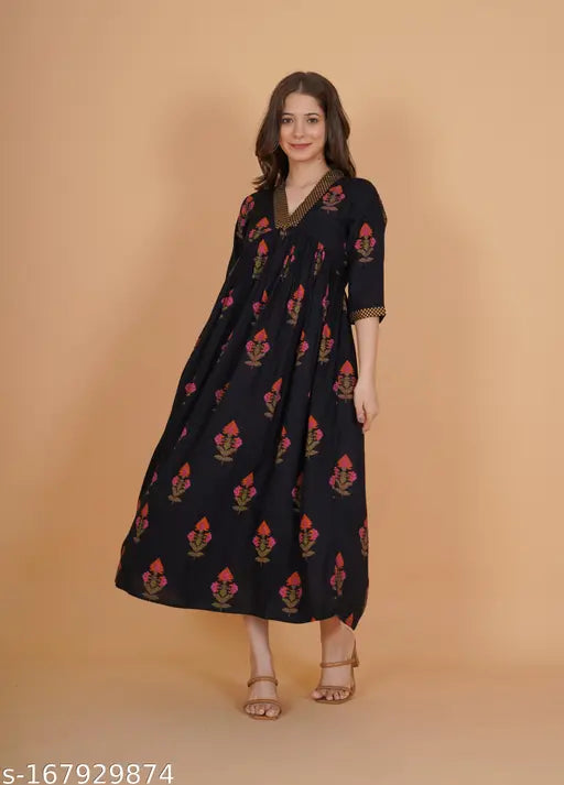 Indianic Women's Black Rayon Floral Gold Print Flared Kurta with 3/4 Sleeves and V Neck, perfect for regular wear with a blend of comfort and traditional style
