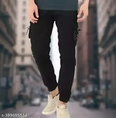 Black cotton blend cargo jeans by Flaying Men DFIE for men's size 28-34, solid pattern on display