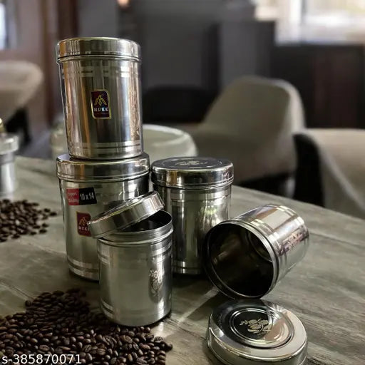 Stainless steel lazer design kitchen storage container box set, featuring airtight dry fruit jars from 500ml to 2kg. Sleek and durable for compact kitchen organization, made in India
