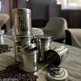 Stainless steel lazer design kitchen storage container box set, featuring airtight dry fruit jars from 500ml to 2kg. Sleek and durable for compact kitchen organization, made in India