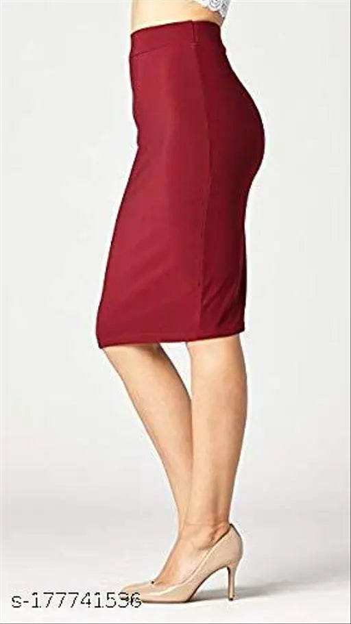 Classic polyester stretchy midi skirt with elastic waist belt, ideal for formal events. Versatile and enduring fashion piece for women. Size: 24 (waist 24in, length 18in), 26-34 available. Made in India