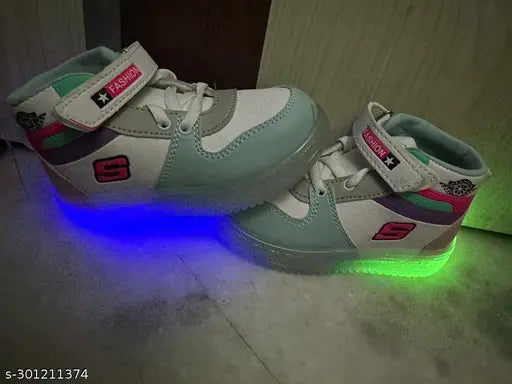 Colorblocked synthetic LED light shoes for kids on display, TPR sole, Velcro fastening