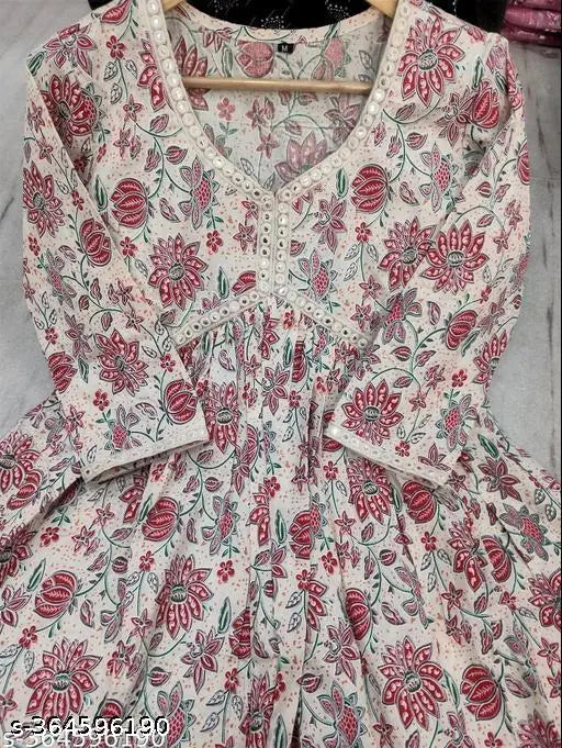 Multicolor tribal print viscose rayon V-neck pleated kurti with three-quarter sleeves, showcasing Indian folk art design on a women's blouse. Available in various sizes from XS to XXXL