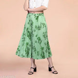 Sneha Creation pleated printed skirt, A-line ankle length, crepe fabric with knitted lining. Flower print, elasticated back, pairs well with crop tops. Comfortable and breathable for humid seasons, available in various sizes (28, 30, 32, 34), origin India