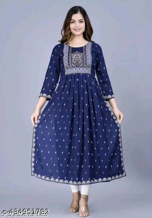 Rayon printed Nayra cut TRANDY women's kurti with three-quarter sleeves, available in multiple sizes from S to XXXL. Indian ethnic wear for fashionable women on display