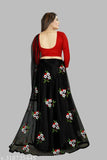 Black satin embroidered semi-stitched lehenga choli with net dupatta, featuring floral patterns and ethnic motifs. Ideal for weddings or festivities in India. Unstitched blouse included