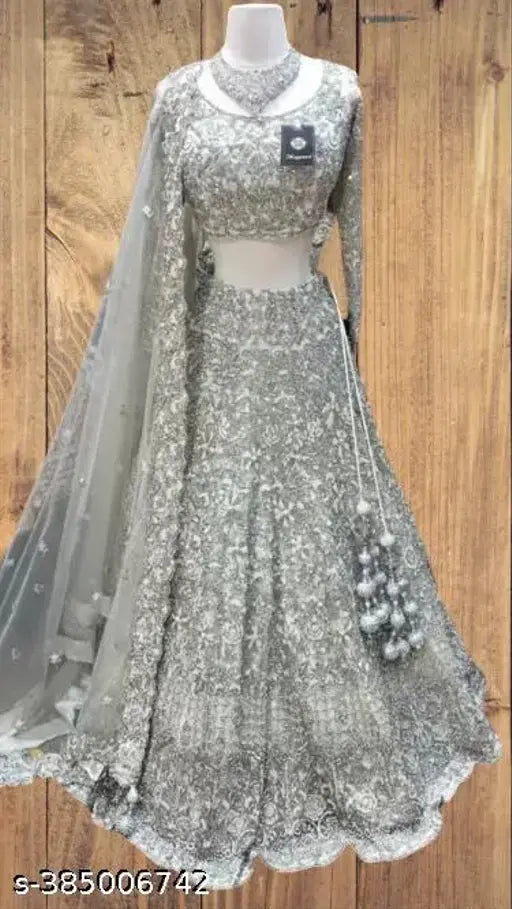 Embellished net lehenga set by Sundar Creation, featuring blouse and dupata for fashion-forward Indian women" (96 characters)