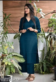 Teal viscose rayon kurta pant set for women, perfect for parties, weddings, office wear. Solid design, three-quarter sleeves, palazzo bottoms. Made in India