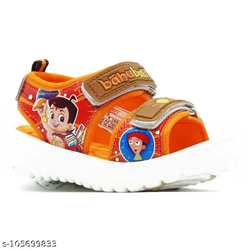 Tan orange and green patent leather chota Bahubali kids sandals for summer wear, ideal for boys aged 2-3 years. Velcro fastening, cartoon character pattern." (124 characters)