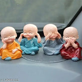 Multicolor small poly resin Buddha statue set of 4 from India