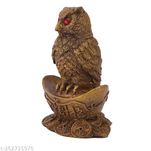 Synthetic resin owl statue sitting on gold Yuan Bao, traditional Vastu decor for wealth attraction, India origin