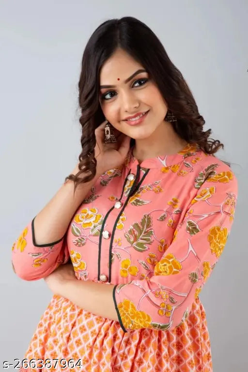 Rayon printed net three-quarter sleeve women's kurti, vibrant Indian fashion on mannequin
