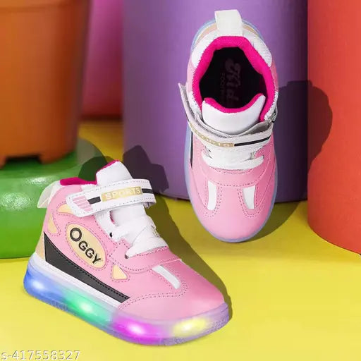 Pink synthetic leather LED light-up shoes for kids outdoor/sports/running, unisex design with velcro fastening and rubber sole. Ideal for children's casual wear or activities