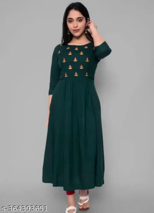 D3 Green rayon three-quarter sleeve embroidered top in multiple sizes, showcasing intricate Indian pattern