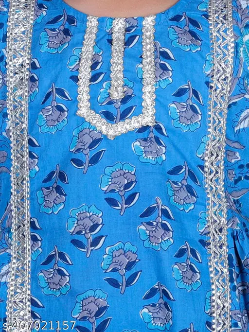 Blue cotton floral print Anarkali flared kurta & pant set for girls, embellished with gota patti work. Perfect for special occasions or festive celebrations. Available in multiple sizes from 18 months to 9-10 years. Made in India