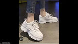 White synthetic Star Frenzy sneakers with lace-up net, featuring rubber soles. Size: 10in (India origin)