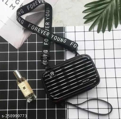 Black acrylic striped net box sling bag, crossbody style for a youthful look
