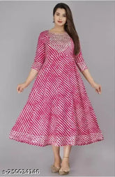 Pink Rayon Anarkali Kurta with Embroidered & Printed Laheriya yoke, three-quarter sleeves, sequins, beads, tassels, side slits. Indian ethnic wear in indigo (Blue), Red, Pink, Orange, Yellow