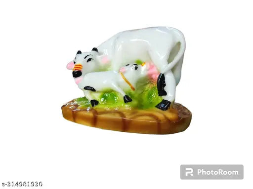 Marble dust/Polyresin Kamdhenu Cow & Calf Showpiece, 10x3x3cm - Decorative figurine symbolizing maternal love, artisanal craftsmanship, and Indian origin