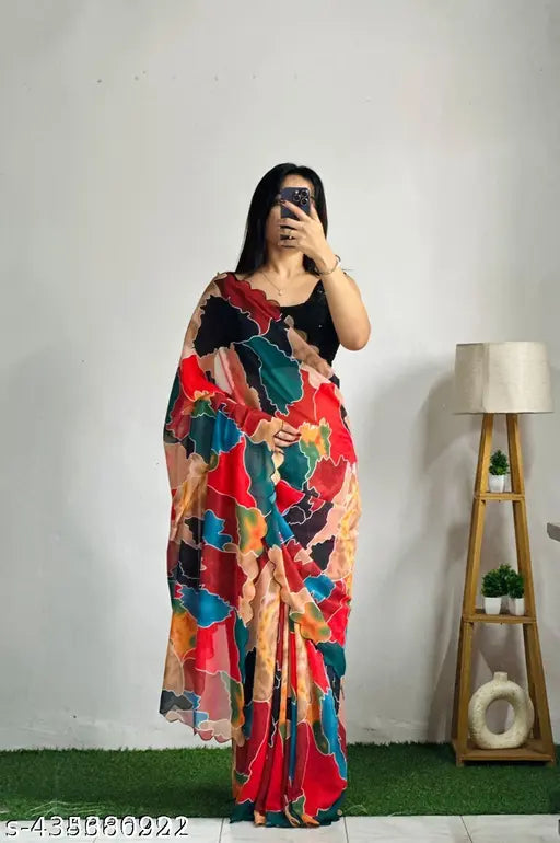 Multi-colored Georgette saree with cutwork border, embellished net blouse for Indian traditional wear