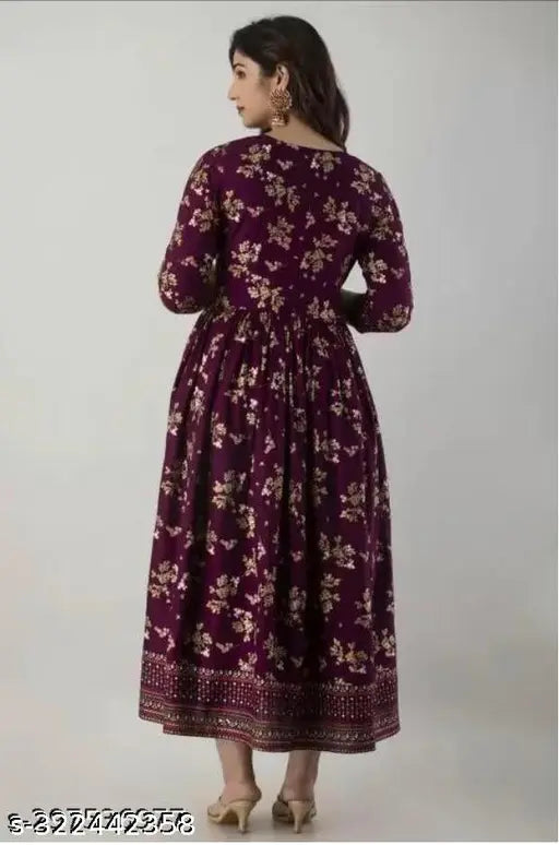 Wine-colored rayon anarkali kurti with tassels, flared silhouette for casual ethnic wear