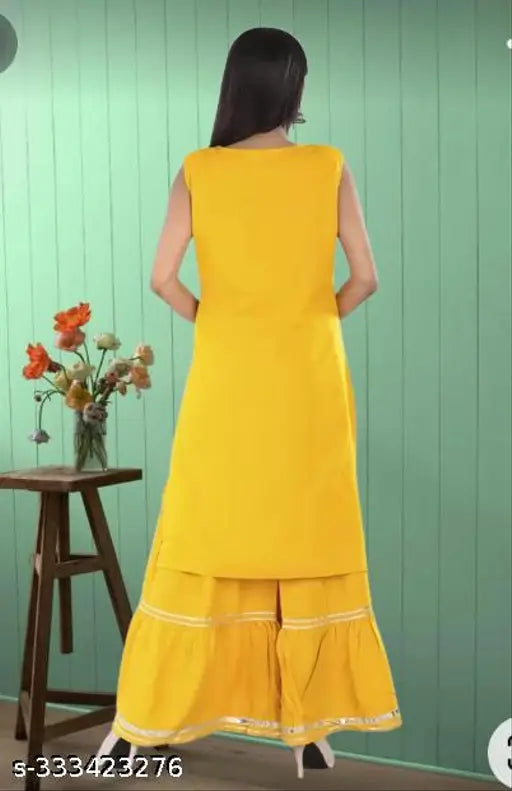 Striped yellow rayon kurta set with sharara bottomwear, three-quarter sleeves