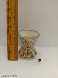 Traditional brass Lord Shiva power drum, intricately crafted Indian musical instrument, approximately 3.25 x 2.75 inches in size
