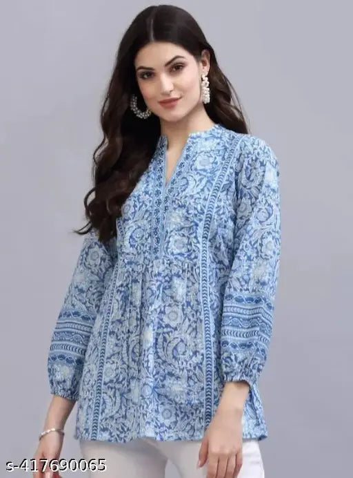 Blue viscose kurti with long sleeves and printed blue flowers, Indian fashion wear for women on mannequin