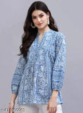 Blue viscose kurti with long sleeves and printed blue flowers, Indian fashion wear for women on mannequin