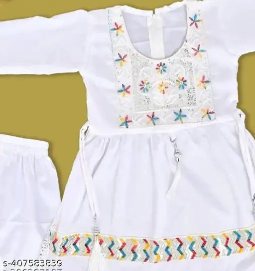 Embroidered cotton blend kids Naira top with matching bottom, three-quarter sleeves, Indian origin infant clothing on display