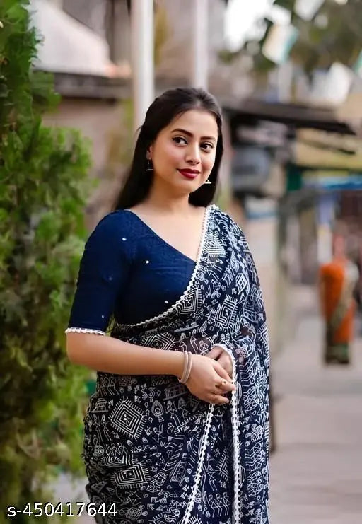 Georgette printed saree with lace border, vibrant jacquard net blouse on mannequin