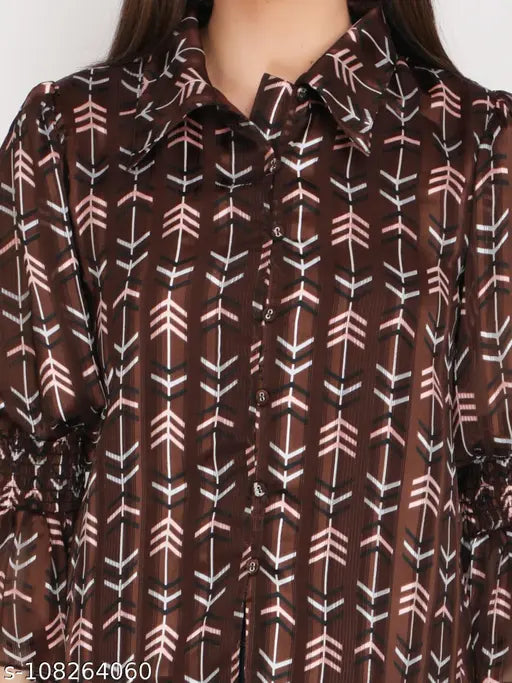 Blue polyester balloon sleeve shirt, elasticated for comfort, printed pattern for style