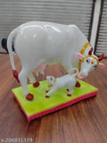 White marble Kamdhenu cow and calf statue, intricate detailing, home decor showpiece, Indian origin (6in x 12cm x 8cm)