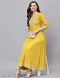 Yellow printed Anarkali gown with embroidery, rayon, three-quarter sleeves. Stylish Indian women's festival wear for sizes S to XXXL. Mirror work detailing on festive occasion dresses