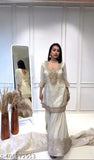 White Chinon silk kurti replica with embroidered three-quarter sleeves, dupatta, and bottomwear. Pure Chinnon silk gharara with elastic, and lace border on dupatta. Ready-to-wear Indian outfit