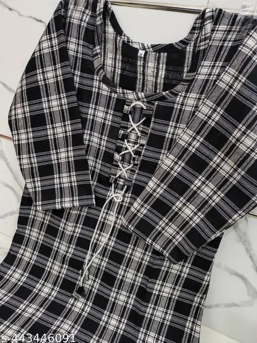 Stylish black woolen kurti with checked pattern, three-quarter sleeves. Black wool kurti on mannequin. Single sizes: M (38in bust, 40in length), L, XL, XXL. Made in India