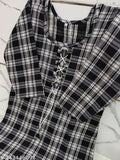 Stylish black woolen kurti with checked pattern, three-quarter sleeves. Black wool kurti on mannequin. Single sizes: M (38in bust, 40in length), L, XL, XXL. Made in India