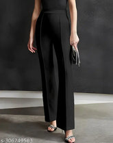 Black lycra women's trousers, comfortable casual and party wear by SELVIA. Elastic waist with zip, pull-on closure, solid design. Perfect for everyday style, suitable for office or evening parties. Made in India