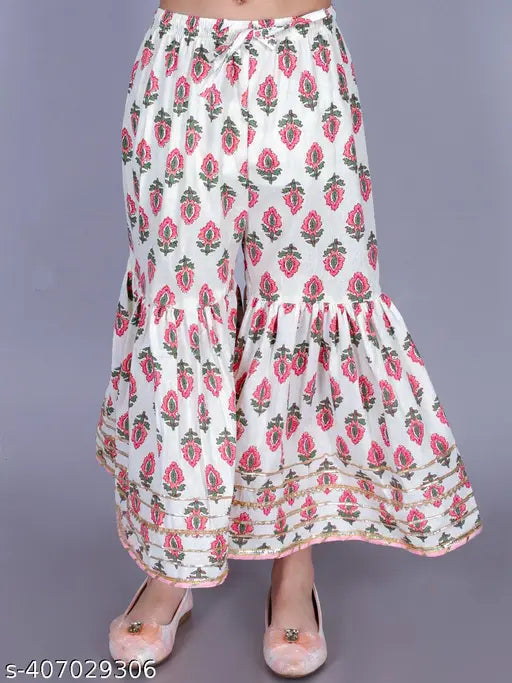 Multicolor cotton floral print anarkali/flared kurta & sharara set for girls, comfortable casual wear. Soft 90% cotton + 10% polyester fabric. Includes sizes from 2-3 years to 13-14 years. Indian origin