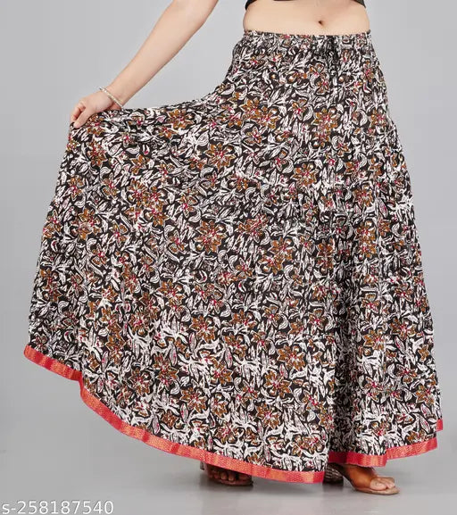 Printed rayon women's long skirt, vibrant pattern and net detail, available in multiple sizes including free size
