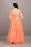 Golden satin lehenga with embellished net dupatta, semi-stitched, Indian wedding wear on mannequin